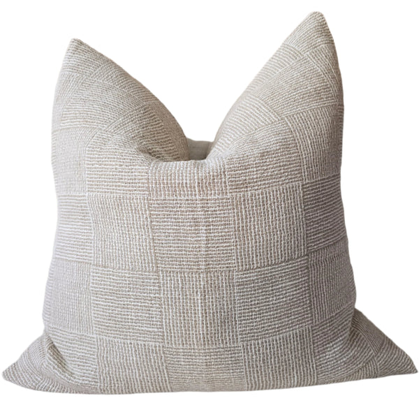 Textured gray pillow on a white background