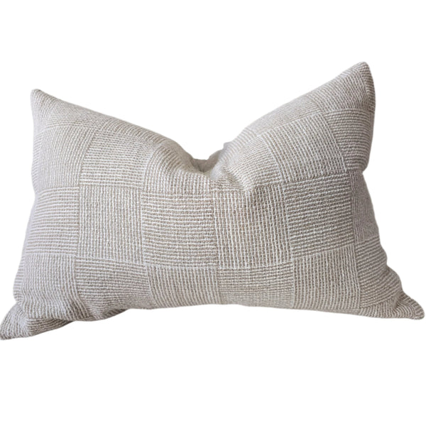 Textured gray pillow on a white background