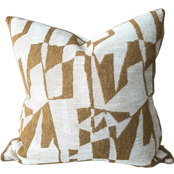 Decorative pillow with geometric pattern on a couch