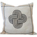 Decorative pillow with a knot pattern on a couch