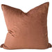 Brown pillow on a beige sofa