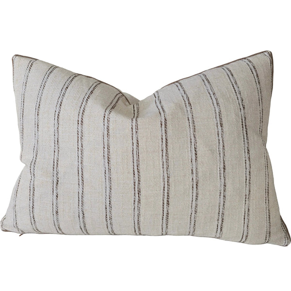 Striped pillow on a gray sofa
