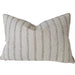 Striped pillow on a gray sofa