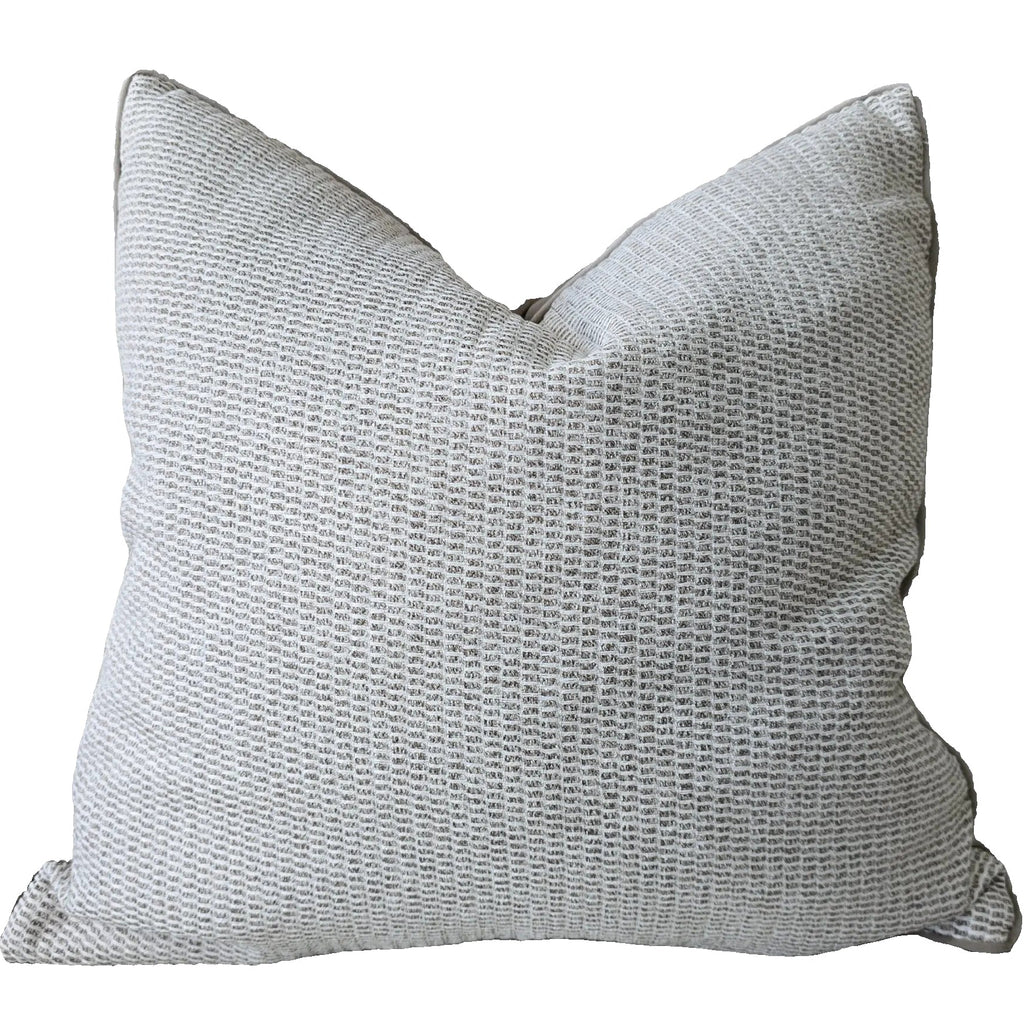 Textured gray pillow on a white background