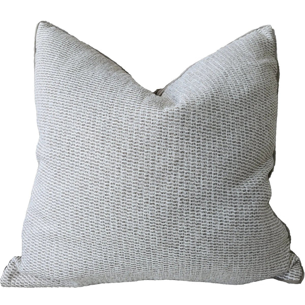 Textured gray pillow on a white background