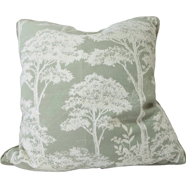 Decorative pillow with tree pattern on a couch